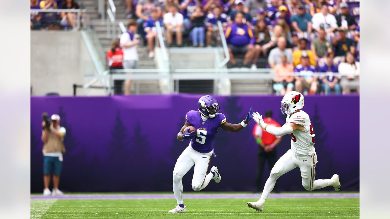 Arizona Cardinals wide receiver Davion Davis (10) runs down the field  during the first half of an NFL preseason football game against the  Minnesota Vikings, Saturday, Aug. 26, 2023, in Minneapolis. (AP