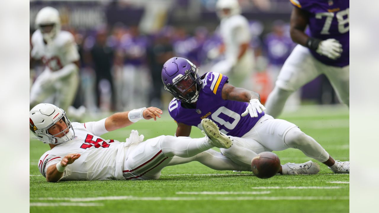 Arizona Cardinals wide receiver Davion Davis (10) runs down the field  during the first half of an NFL preseason football game against the  Minnesota Vikings, Saturday, Aug. 26, 2023, in Minneapolis. (AP