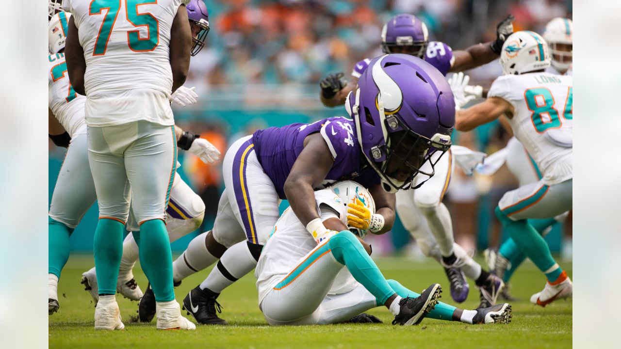 Cook's late TD ices Vikings' 24-16 win over Dolphins