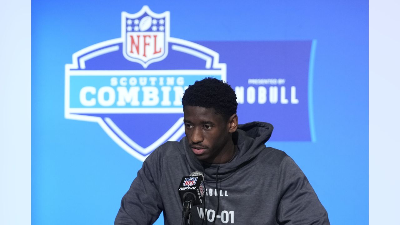 Jordan Addison Suits Up in Pink Florals & Sneakers at NFL Draft 2023 –  Footwear News