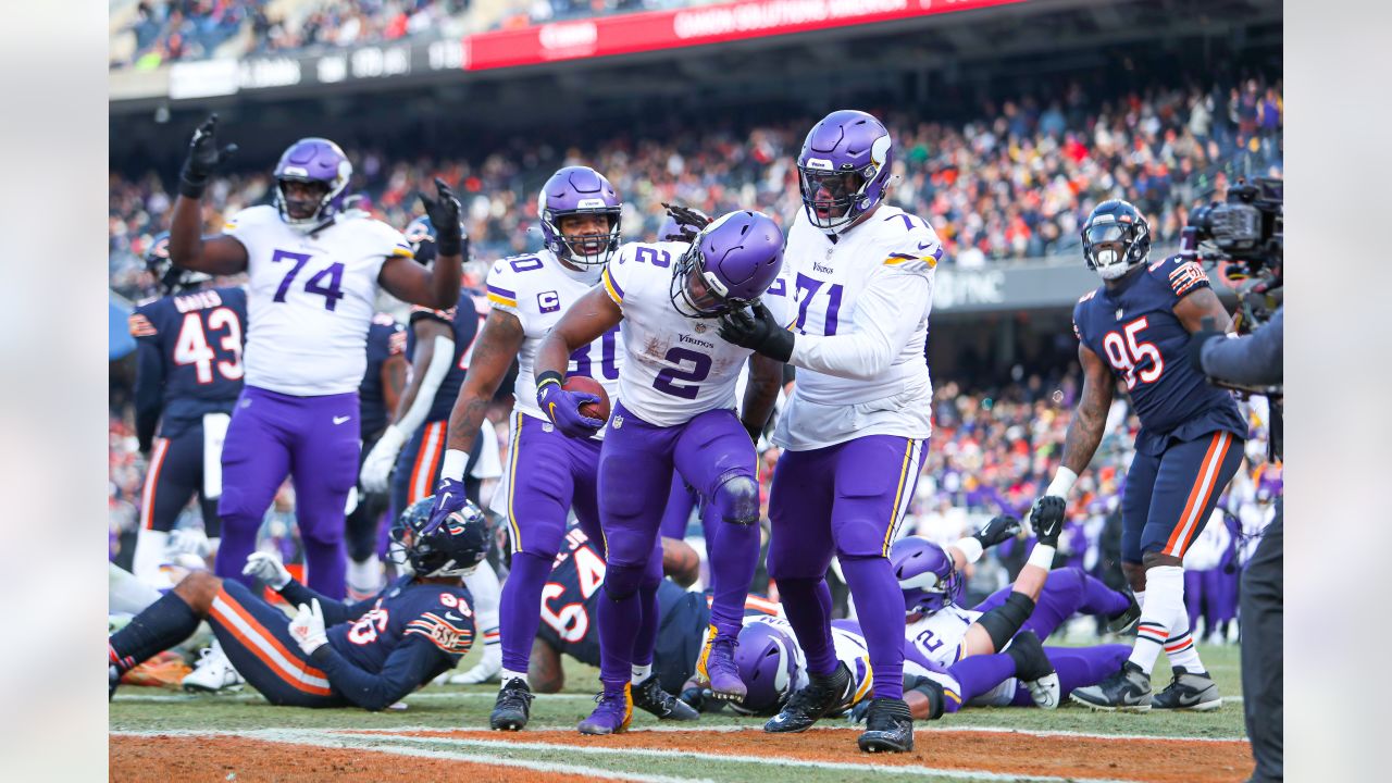 Minnesota Vikings cornerback Duke Shelley (20) greets safety Harrison Smith  (22) during the first half of