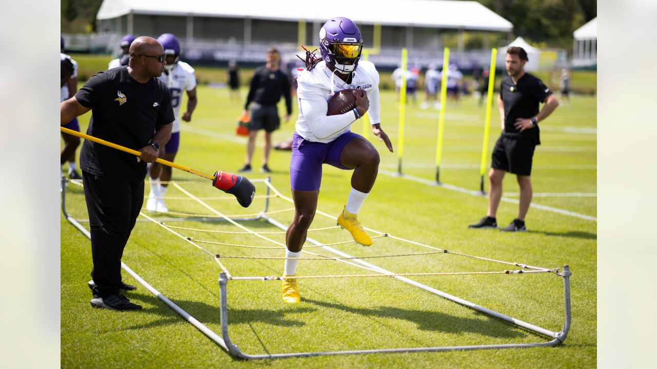 Minnesota Vikings cornerback Andrew Booth Jr. warms up before their game  against the San Francisco 49ers during an NFL preseason football game,  Saturday, Aug. 20, 2022, in Minneapolis. (AP Photo/Craig Lassig Stock