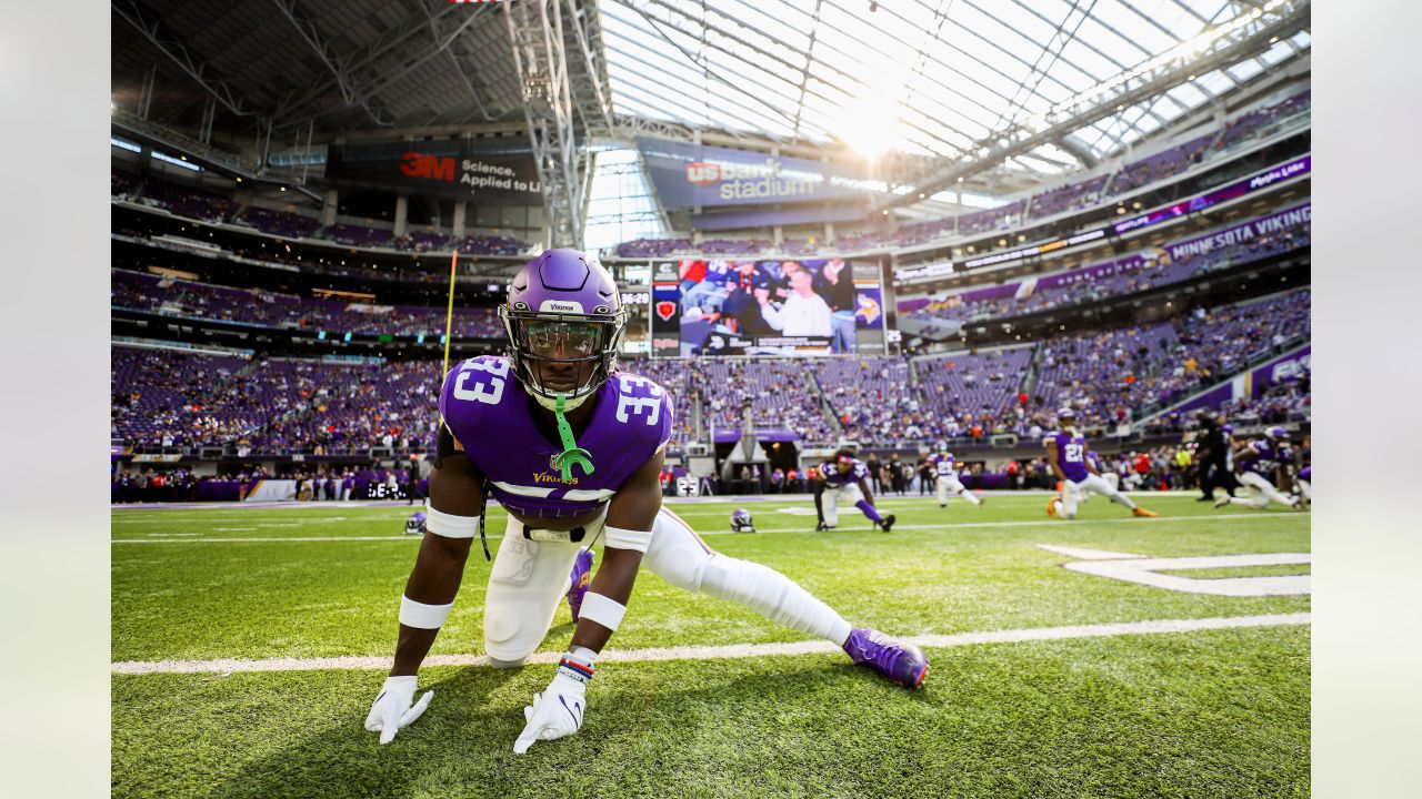 MINNEAPOLIS, MN - OCTOBER 09: Chicago Bears Quarterback Justin Fields (1)  points to the sky during an NFL game between the Minnesota Vikings and  Chicago Bears on October 9, 2022 at U.S.