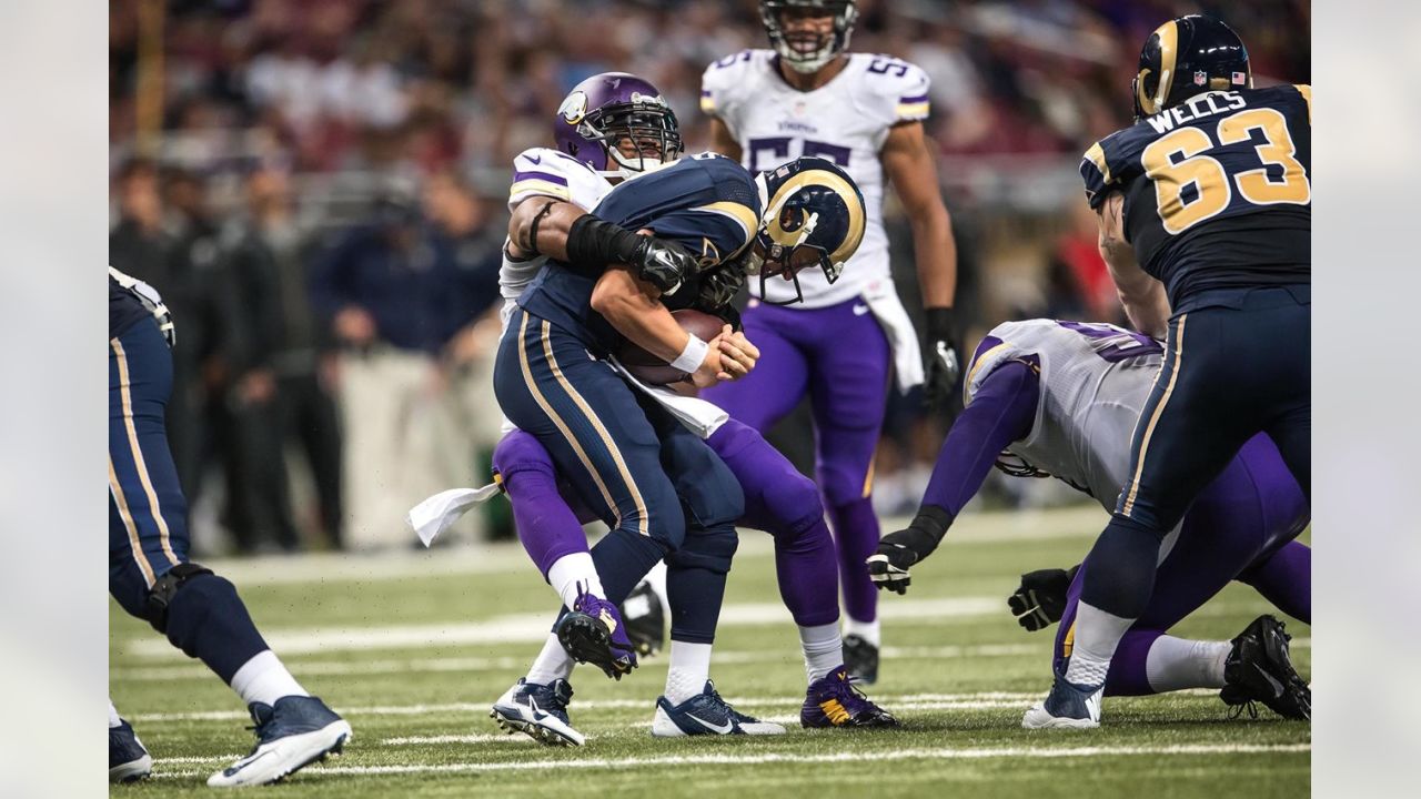 Minnesota Vikings quarterback Sage Rosenfels sets up to pass the football  in the first quarter against the St. Louis Rams in pre-season play at the  Edward Jones Dome in St. Louis on