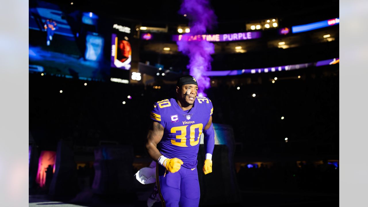 Minnesota Vikings fullback C.J. Ham (30) walks off the field after an NFL  football game against the Chicago Bears, Sunday, Jan. 8, 2023, in Chicago.  (AP Photo/Kamil Krzaczynski Stock Photo - Alamy