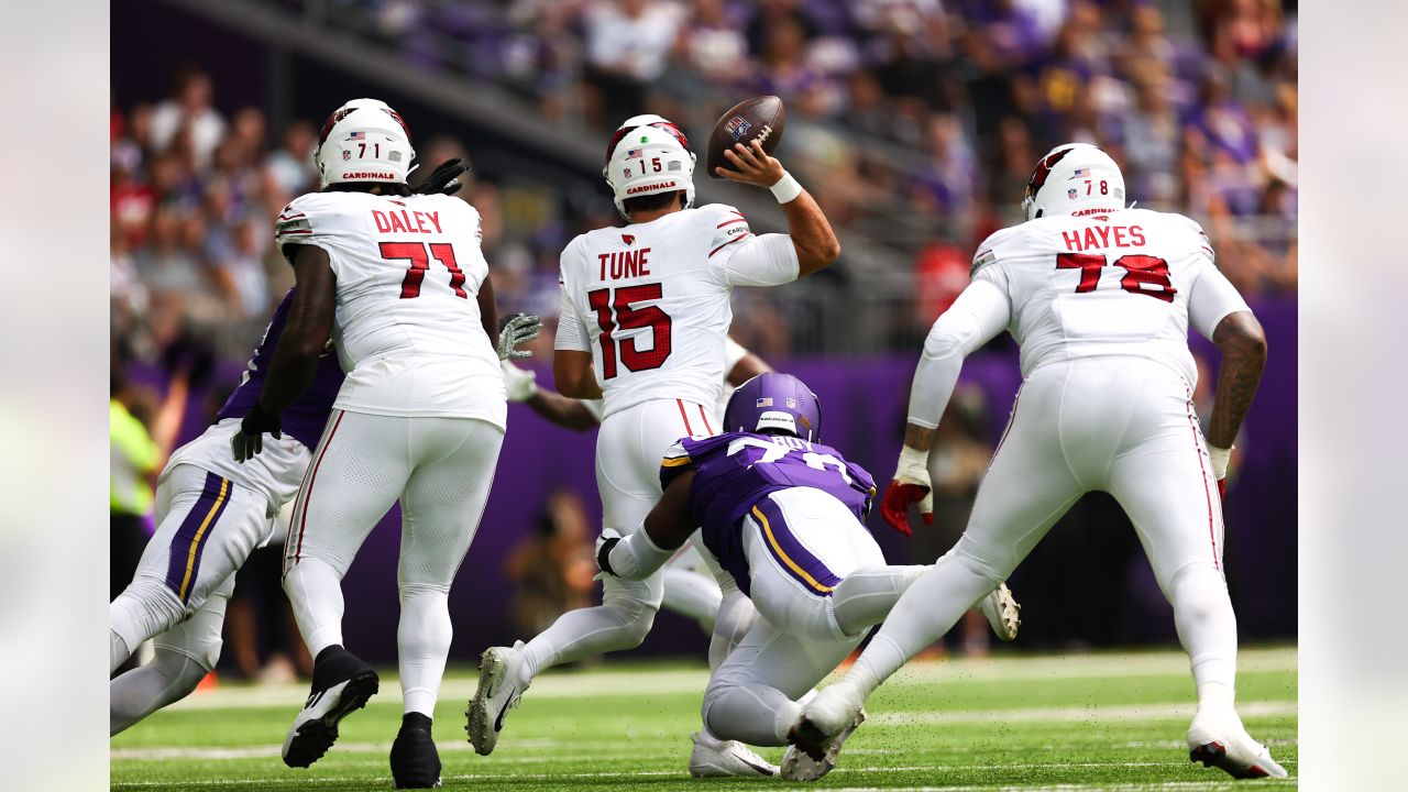 Arizona Cardinals wide receiver Davion Davis (10) runs down the field  during the first half of an NFL preseason football game against the  Minnesota Vikings, Saturday, Aug. 26, 2023, in Minneapolis. (AP