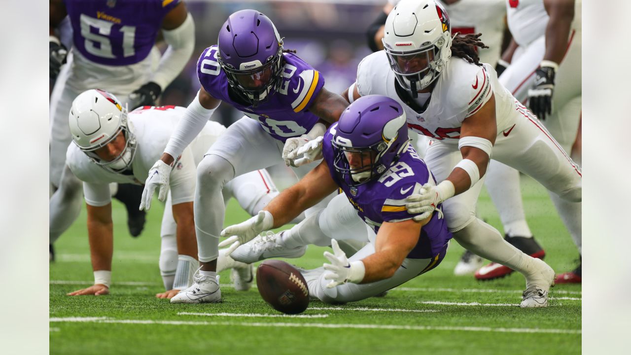 Arizona Cardinals wide receiver Davion Davis (10) runs down the field  during the first half of an NFL preseason football game against the  Minnesota Vikings, Saturday, Aug. 26, 2023, in Minneapolis. (AP