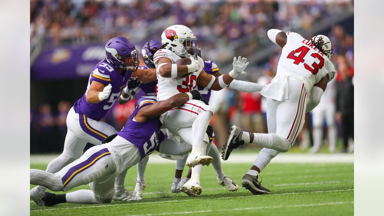 Arizona Cardinals wide receiver Davion Davis (10) runs down the field  during the first half of an NFL preseason football game against the  Minnesota Vikings, Saturday, Aug. 26, 2023, in Minneapolis. (AP