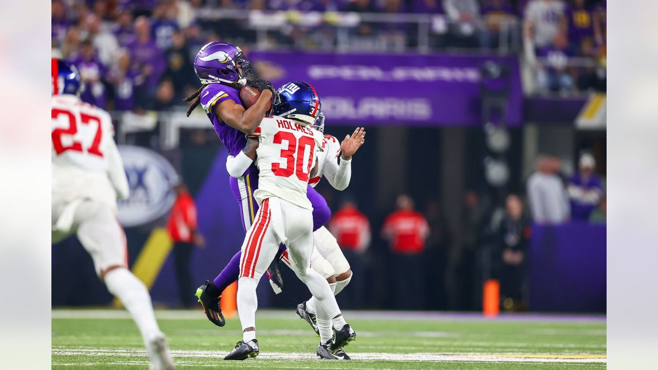 New York Giants' Adoree' Jackson stops Minnesota Vikings' Justin Jefferson  after a catch during the second half of an NFL wild card football game  Sunday, Jan. 15, 2023, in Minneapolis. (AP Photo/Charlie