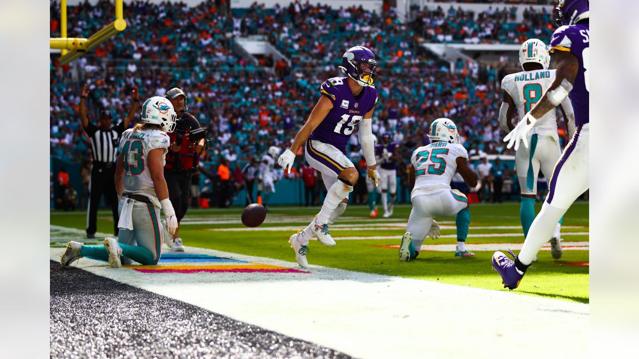 Minnesota Vikings safety Camryn Bynum (24) defends Miami Dolphins wide  receiver Tyreek Hill (10) during the