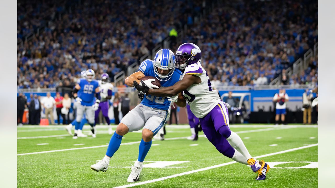 NFC wide receiver Adam Thielen (19), of the Minnesota Vikings, scores a  touchdown as AFC defensive back A.J. Buoy (21), of the Jacksonville Jaguars  defends, during the first half of the NFL