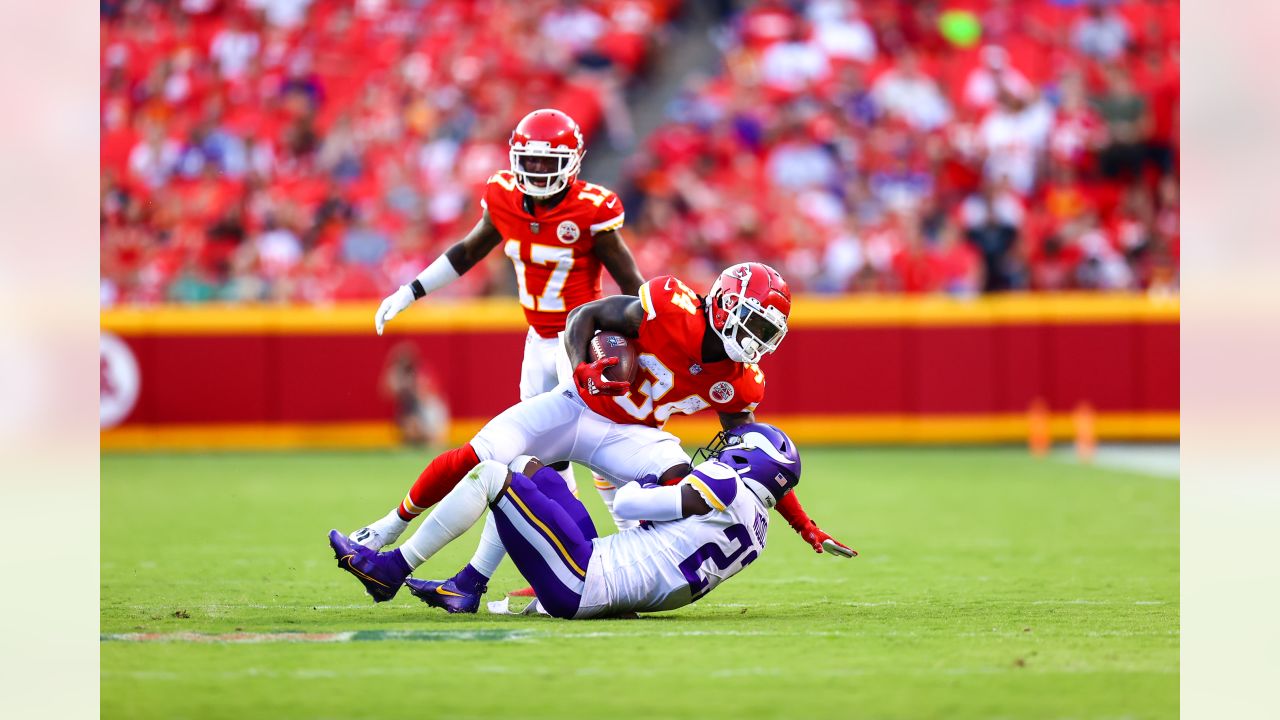 Kansas City Chiefs quarterback Patrick Mahomes (15) celebrates with tight  end Travis Kelce (87) after throwing a 67-yard touchdown pass to Tyreek  Hill during the first quarter of an NFL football game