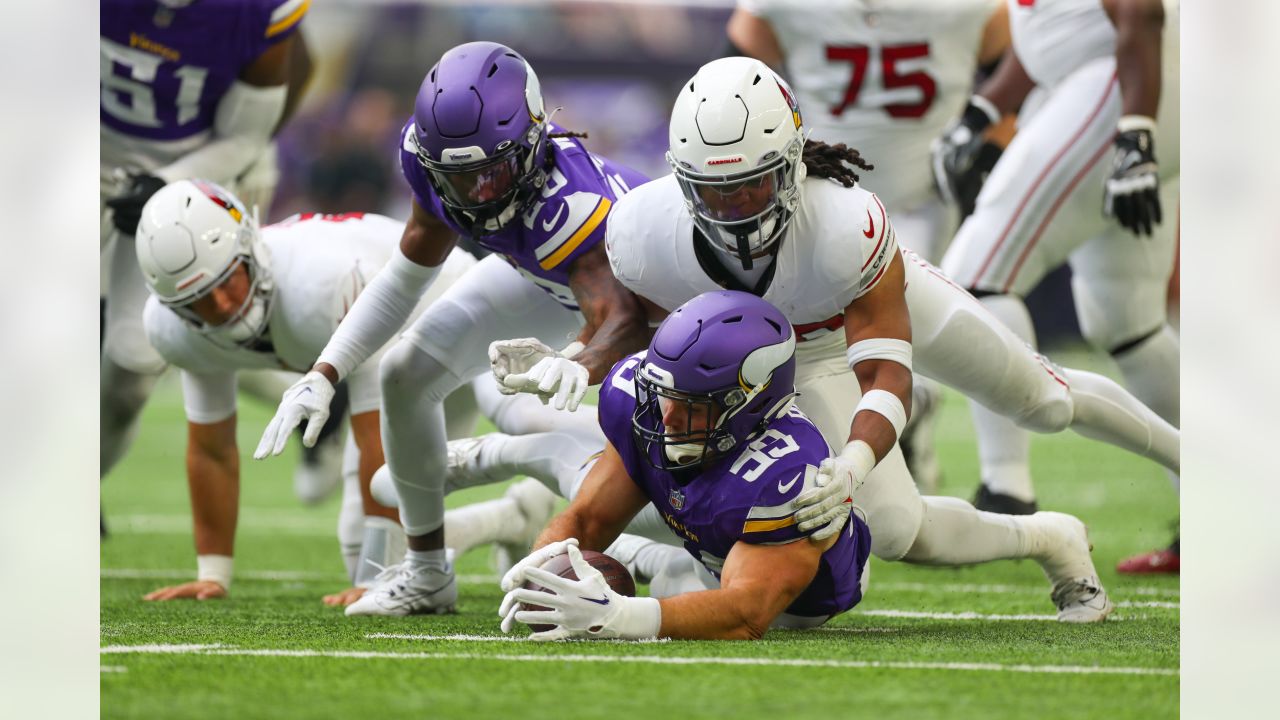 Arizona Cardinals wide receiver Davion Davis (10) runs down the field  during the first half of an NFL preseason football game against the  Minnesota Vikings, Saturday, Aug. 26, 2023, in Minneapolis. (AP