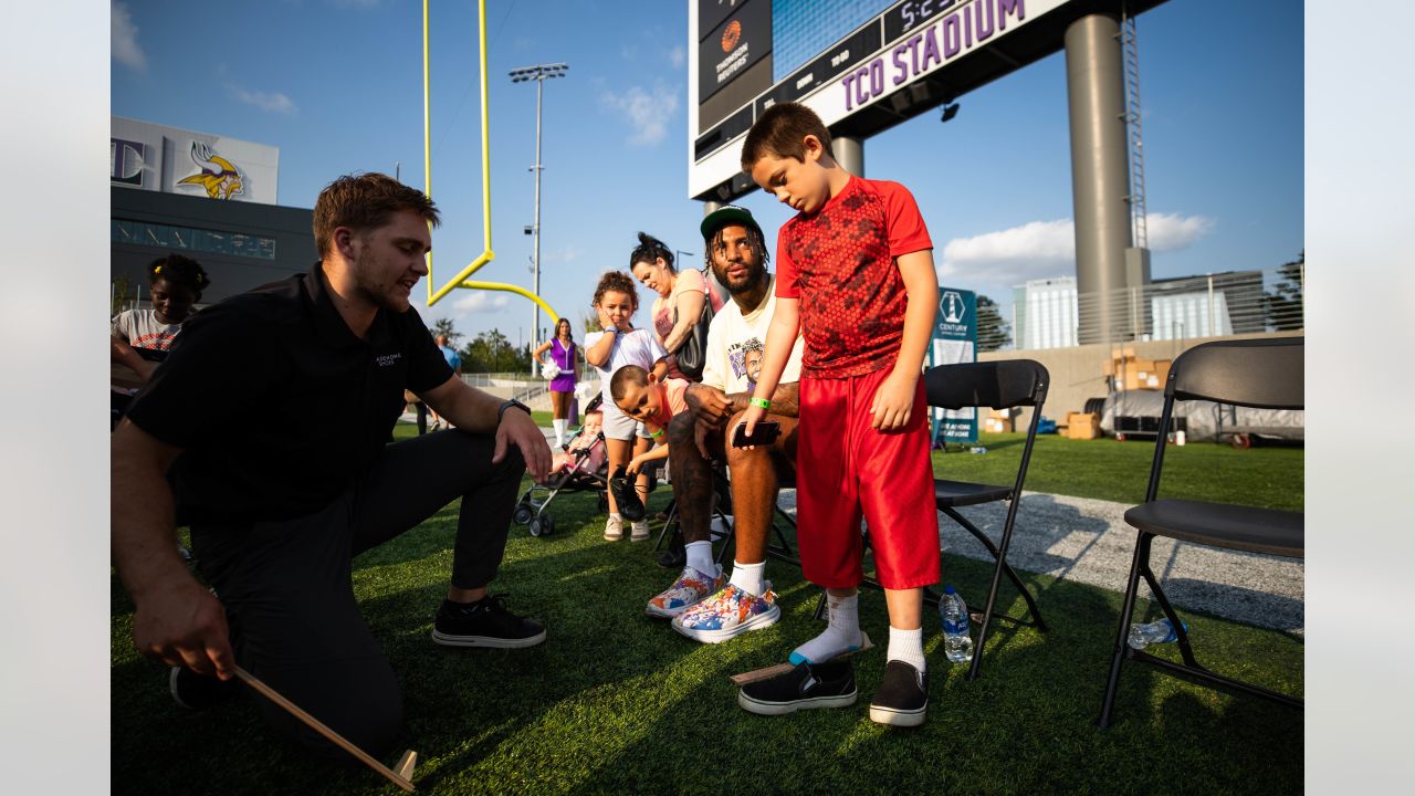 Vikings & Tradehome Shoes Team Up to Surprise 500 Foster Children