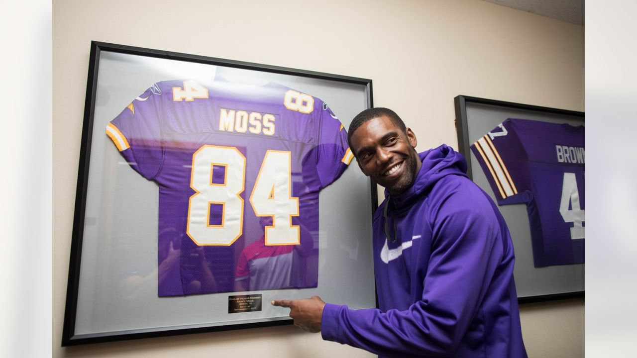 Wide receiver Randy Moss of the Minnesota Vikings smiles as he talks