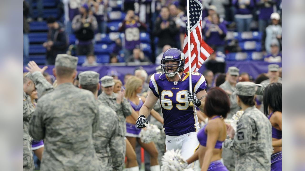 Vikings' Jared Allen carried an American flag onto Mall of America Field to  honor servicemen and women on Veterans' Day Sunday, November 11, 2012, in  Minneapolis, Minnesota. The Minnesota Vikings defeated the