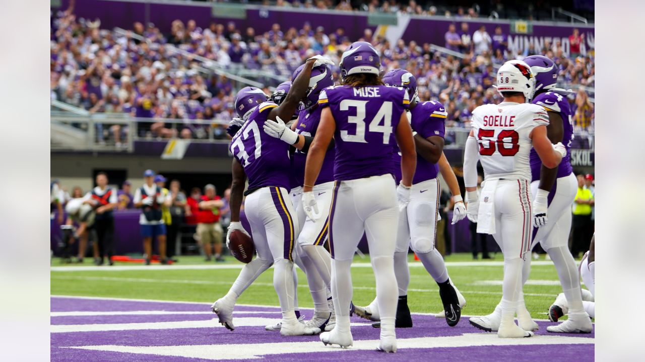 Arizona Cardinals wide receiver Davion Davis (10) runs down the field  during the first half of an NFL preseason football game against the  Minnesota Vikings, Saturday, Aug. 26, 2023, in Minneapolis. (AP