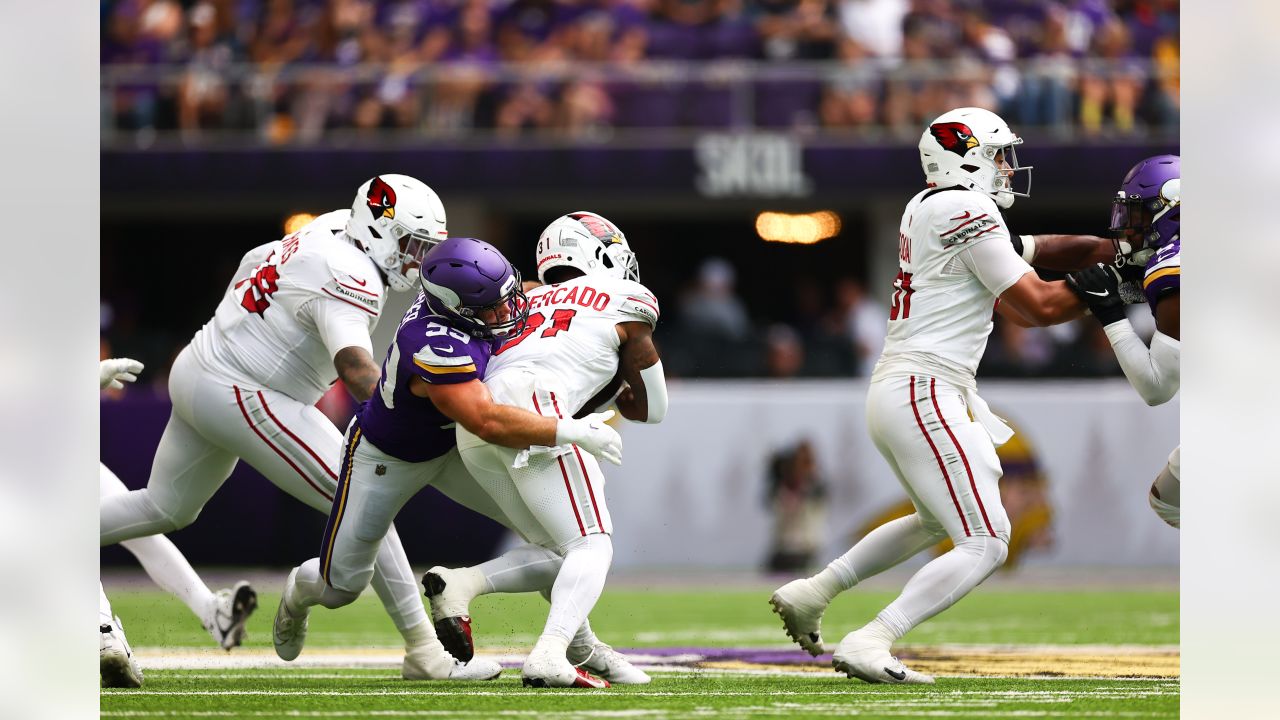 Arizona Cardinals wide receiver Davion Davis (10) runs down the field  during the first half of an NFL preseason football game against the  Minnesota Vikings, Saturday, Aug. 26, 2023, in Minneapolis. (AP