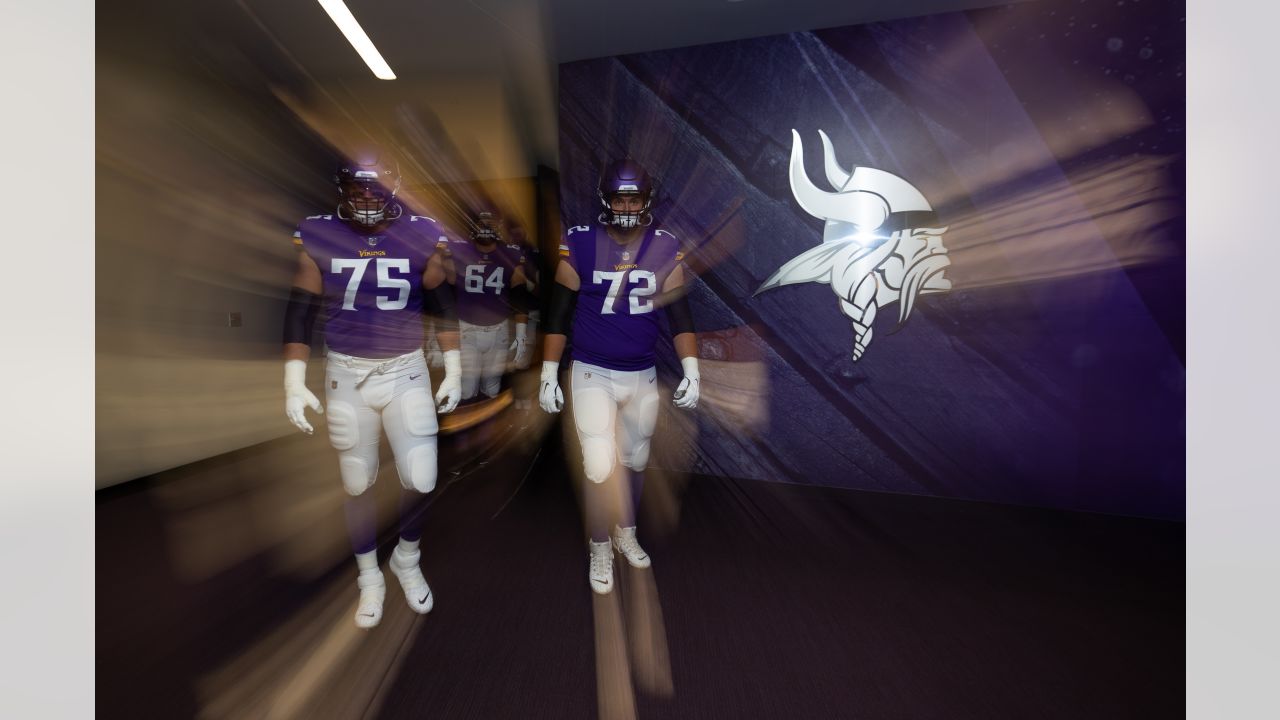 Minnesota Vikings offensive tackle Blake Brandel (64) looks at a