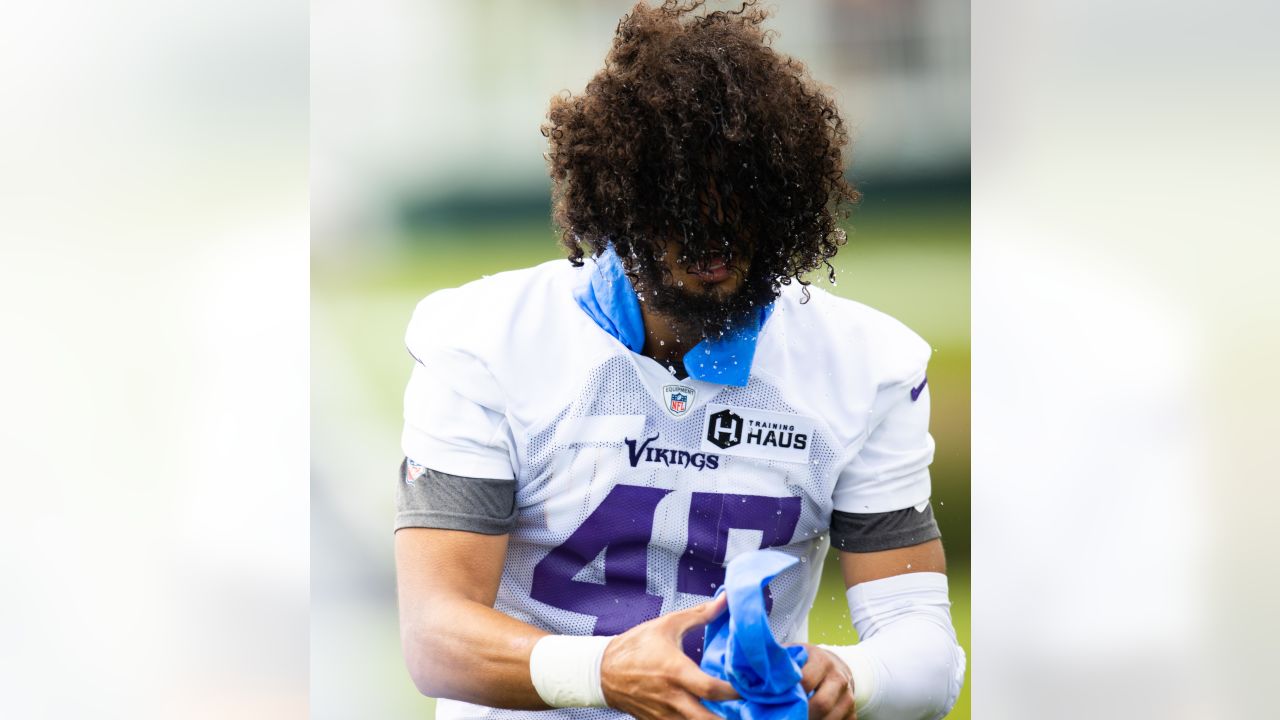 Minnesota Vikings fullback C.J. Ham (30) and offensive tackle Oli Udoh (74)  chat during the NFL football team's training camp Tuesday, Aug. 3, 2021, in  Eagan, Minn. (AP Photo/Jim Mone Stock Photo - Alamy