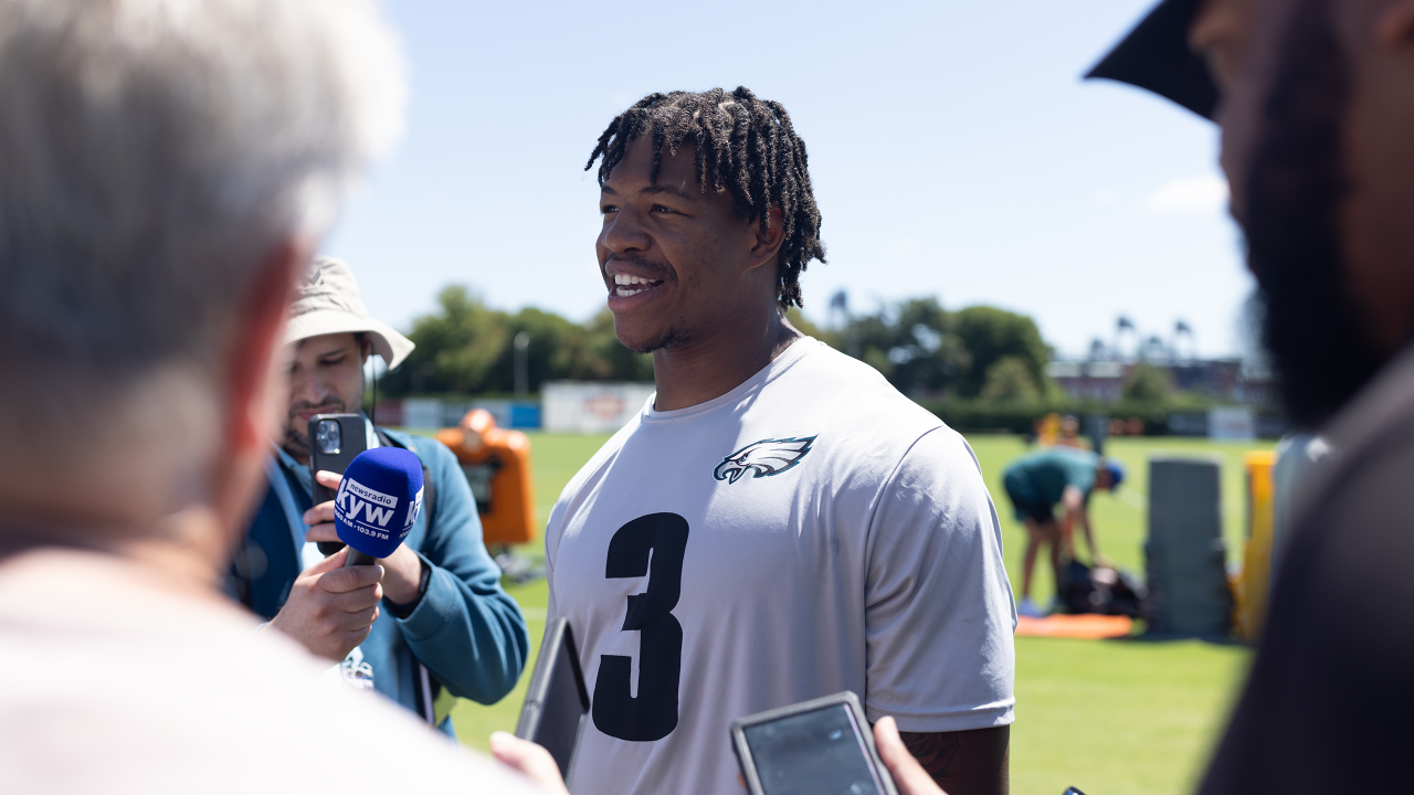 Philadelphia Eagles' Jalen Carter hands his jersey over to a member of the  Military during practice at NFL football training camp, Sunday, July 30,  2023, in Philadelphia. (AP Photo/Chris Szagola Stock Photo 