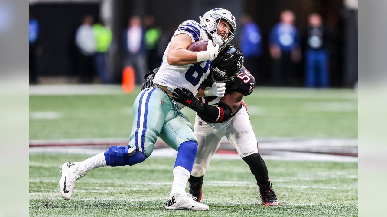 Atlanta Falcons linebacker Foye Oluokun (54) reaches ts after a Atlanta  Falcons recovery on a kickoff against the New Orleans Saints during the  second half of an NFL football game, Thursday, Nov.