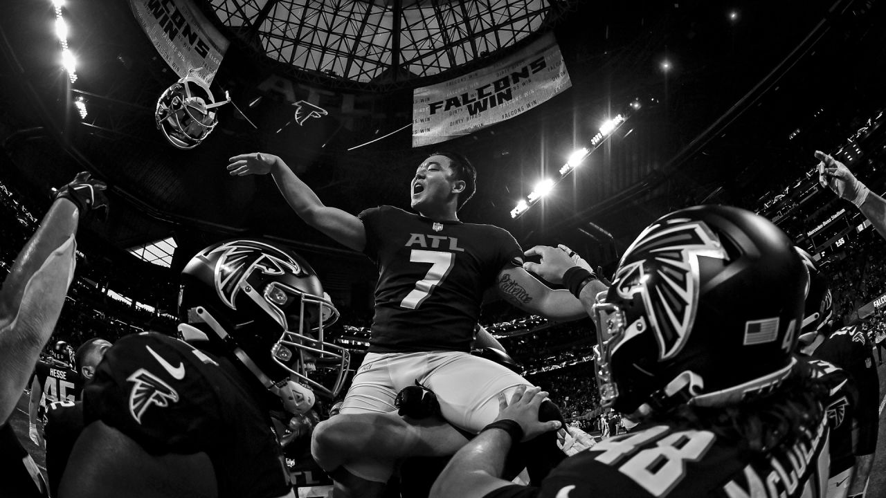 Atlanta Falcons vs. Carolina Panthers. NFL Game. American Football League  match. Silhouette of professional player celebrate touch down. Screen in  bac Stock Photo - Alamy