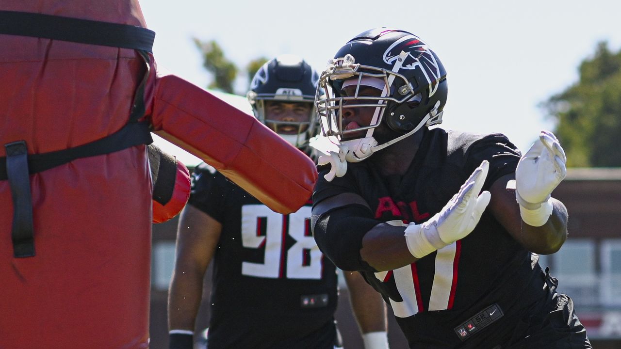 Atlanta Falcons defensive end Grady Jarrett wears a necklace as he