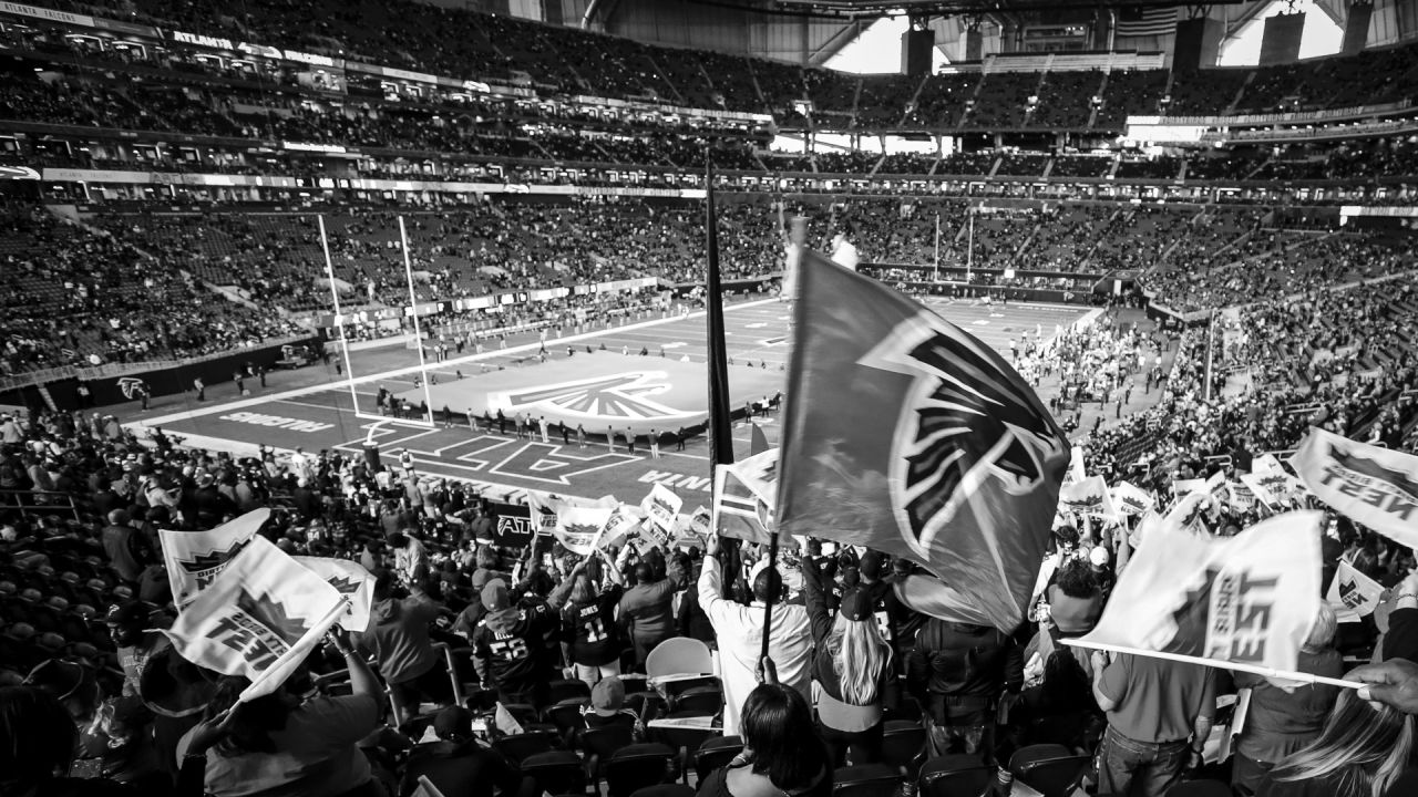 Fans watch as the Atlanta Falcons play the Carolina Panthers in the third  quarter of their NFL football game at the Georgia Dome in Atlanta Sunday,  Sept. 20, 2009. (AP Photo/Dave Martin