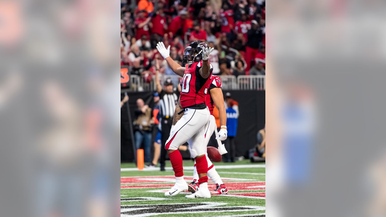 Tampa Bay Buccaneers vs. Atlanta Falcons. Fans support on NFL Game.  Silhouette of supporters, big screen with two rivals in background Stock  Photo - Alamy