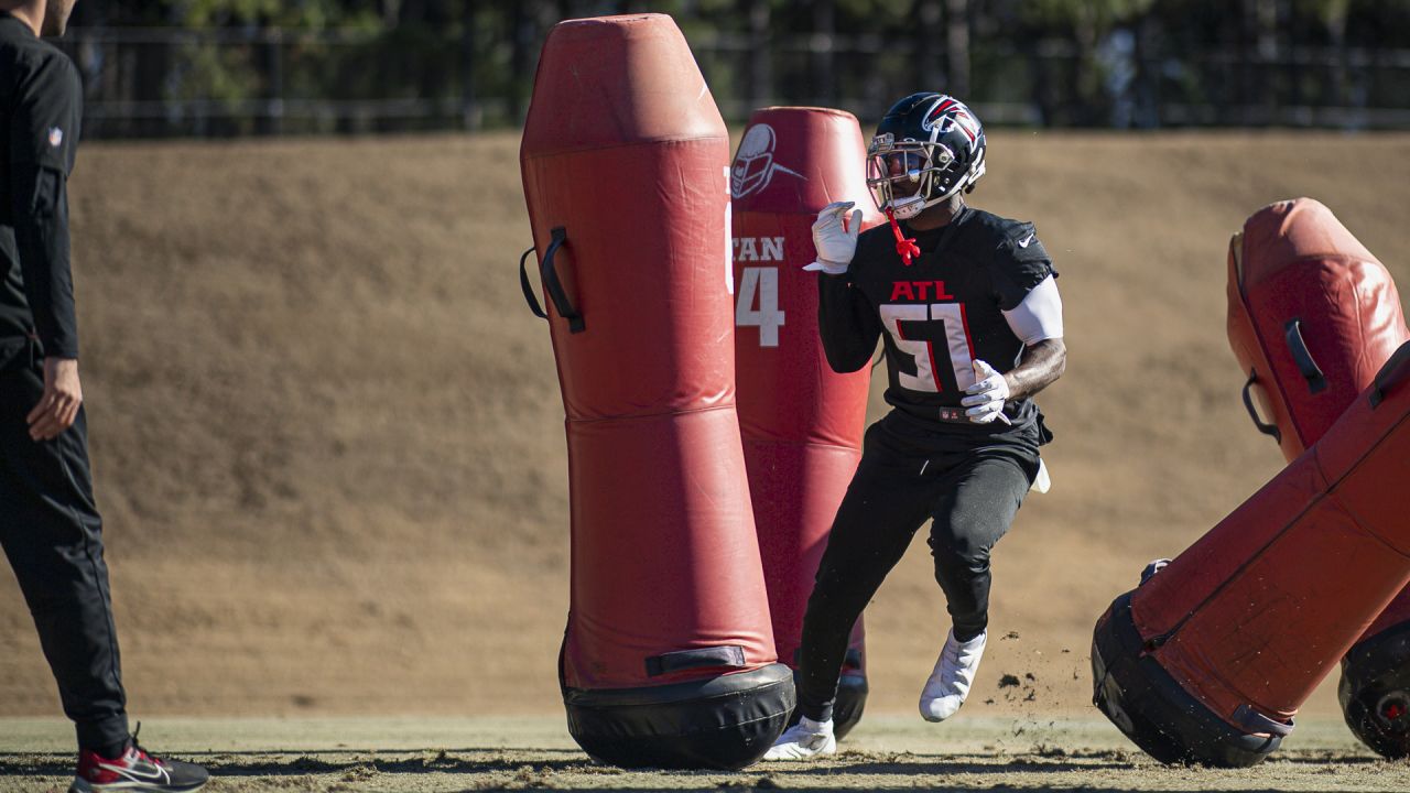 Atlanta Falcons linebacker DeAngelo Malone (51) works during the