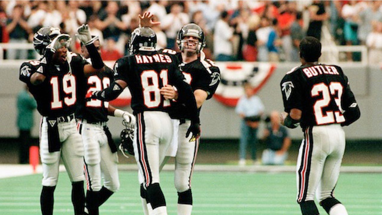 Jessie Tuggle of the Atlanta Falcons against Steve Young of the San News  Photo - Getty Images