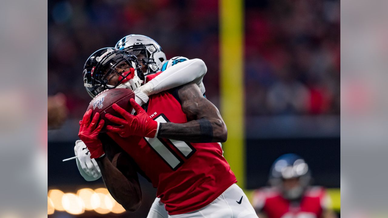 Atlanta Falcons linebacker Foye Oluokun (54) tackles Carolina Panthers wide  receiver Robby Ande …