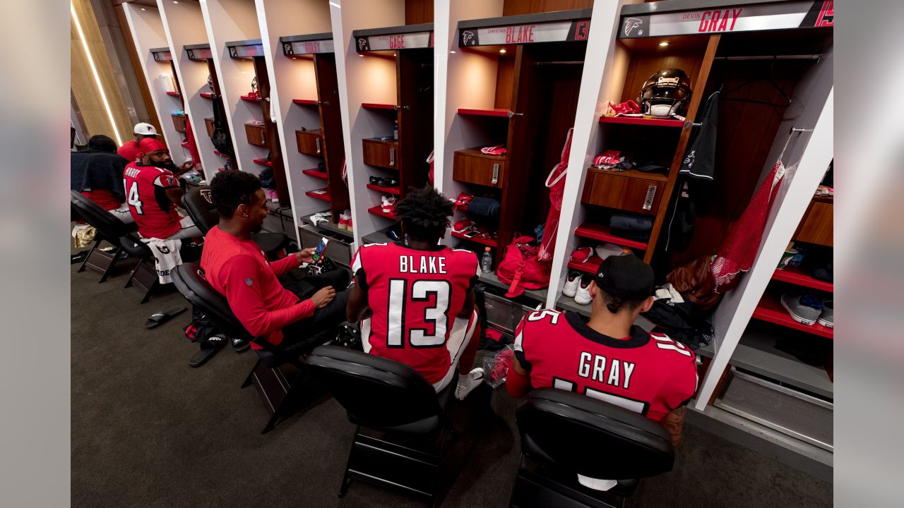 Atlanta Falcons wide receiver Christian Blake #13 runs out of the tunnel  during pregame against the …