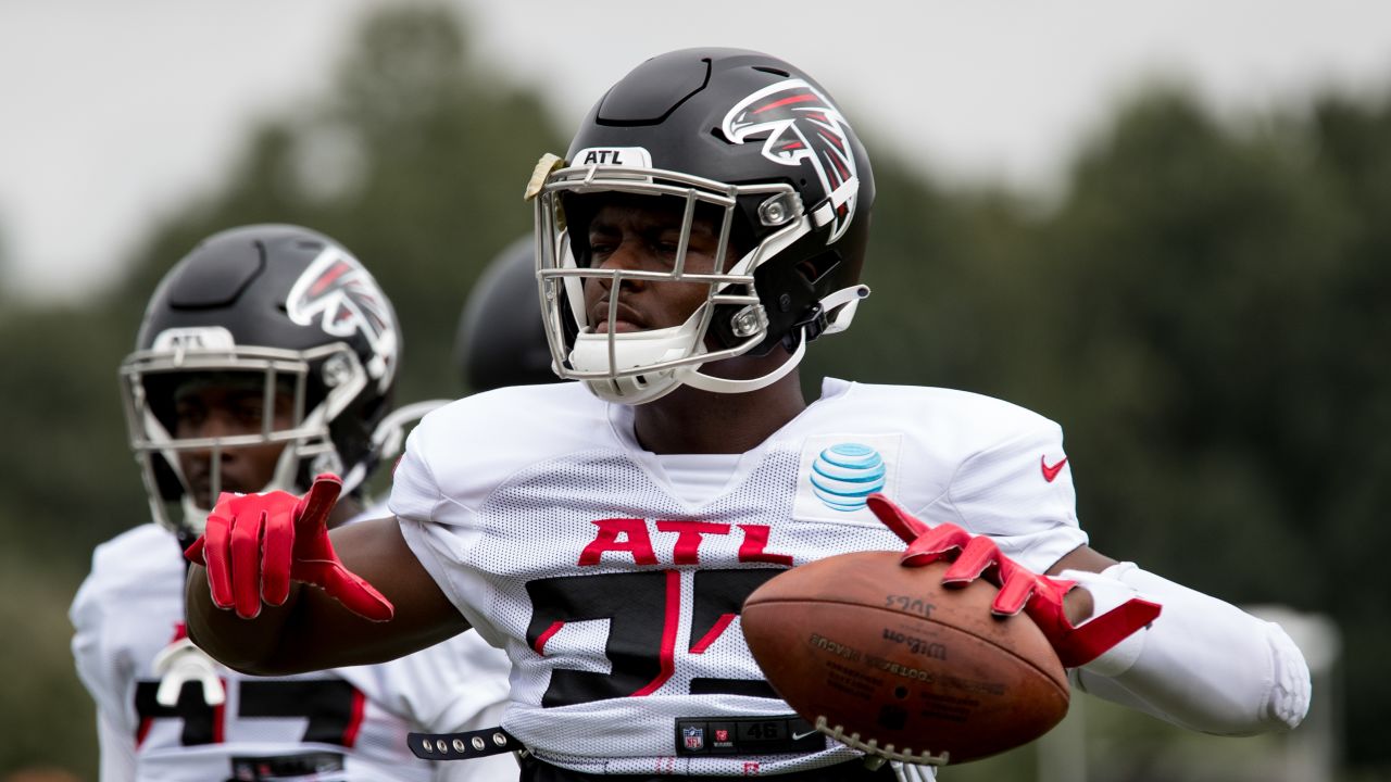 Atlanta Falcons safety Jaylinn Hawkins (32) works against