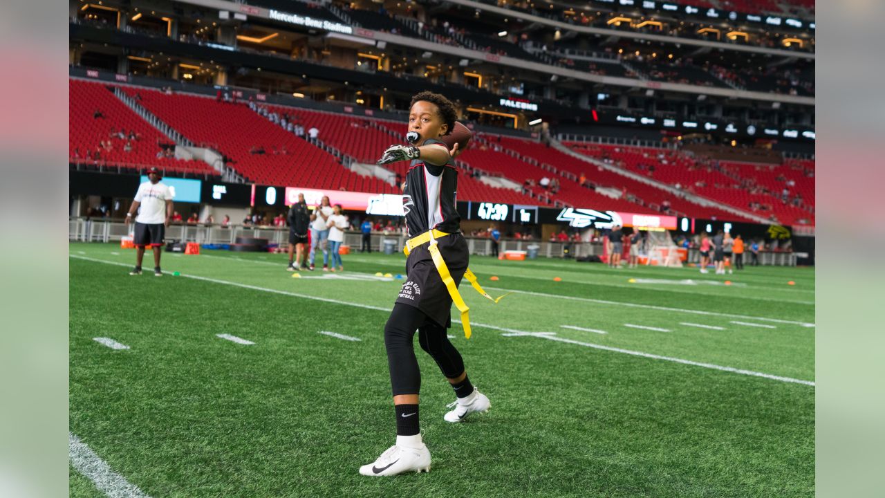 How playing flag football at Mercedes-Benz Stadium can help raise