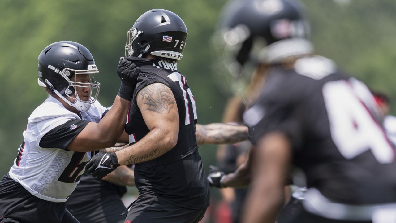 FLOWERY BRANCH, GA - JULY 30: A Falcons helmet on the field during Saturday  morning workouts for the Atlanta Falcons on July, 30, 2022 at the Atlanta  Falcons Training Facility in Flowery