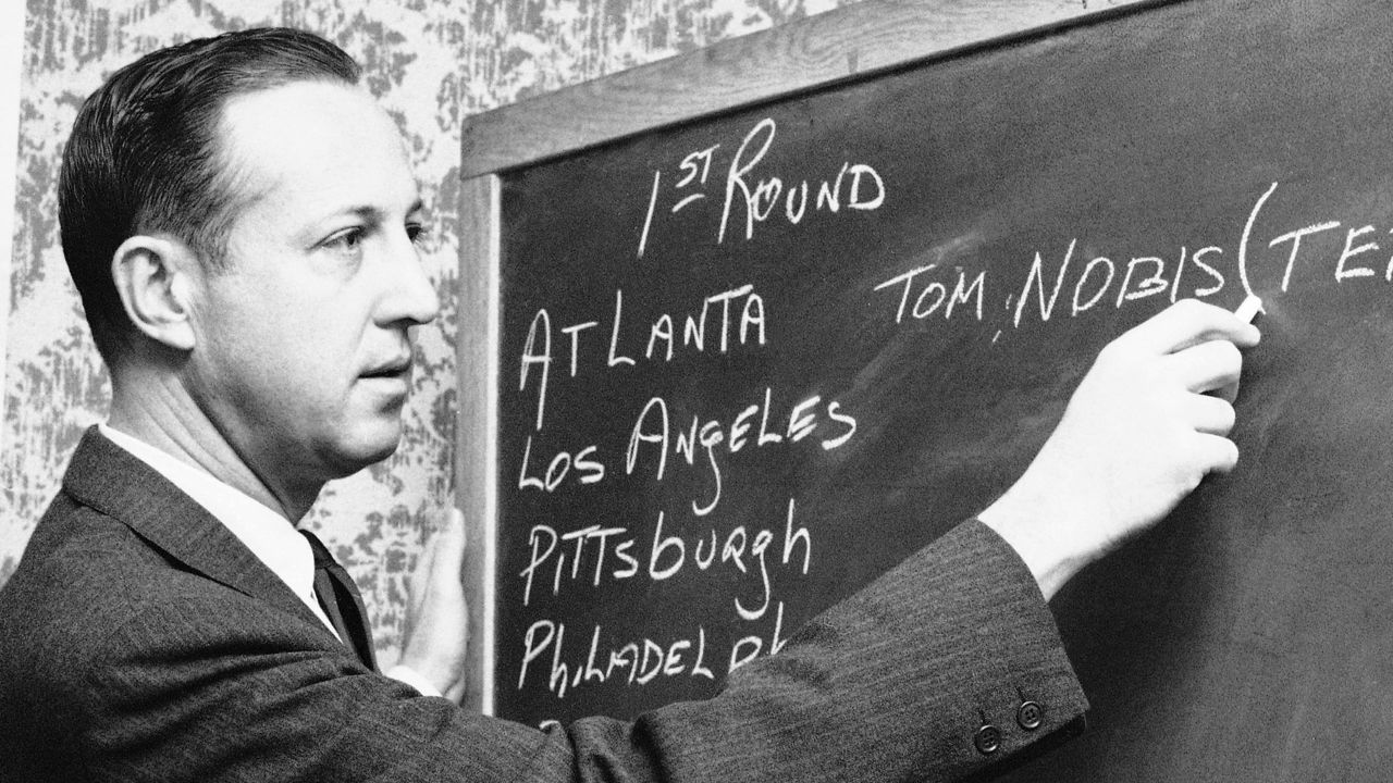 A banner of Tommy Nobis, the first player drafted by theAtlanta Falcons is  seen as he is honored during the first half of an NFL football game between  the Atlanta Falcons and