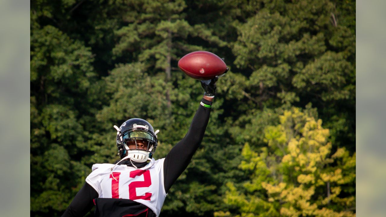 Atlanta Falcons wide receiver Mohamed Sanu (12) breaks for a drink during  an NFL football training camp practice, Tuesday, July 23, 2019, in Flowery  Branch, Ga. (AP Photo/Andrea Smith Stock Photo - Alamy