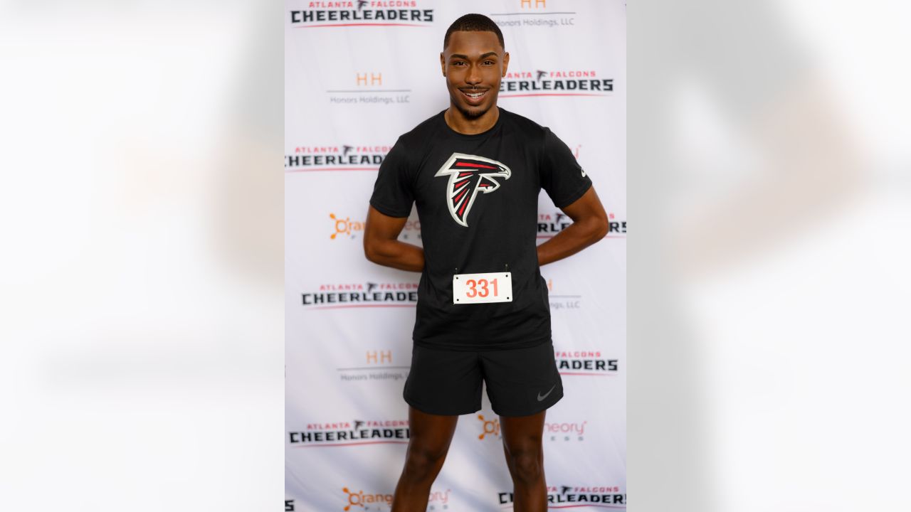 Atlanta Falcons fans cheer for the players during the NFL football