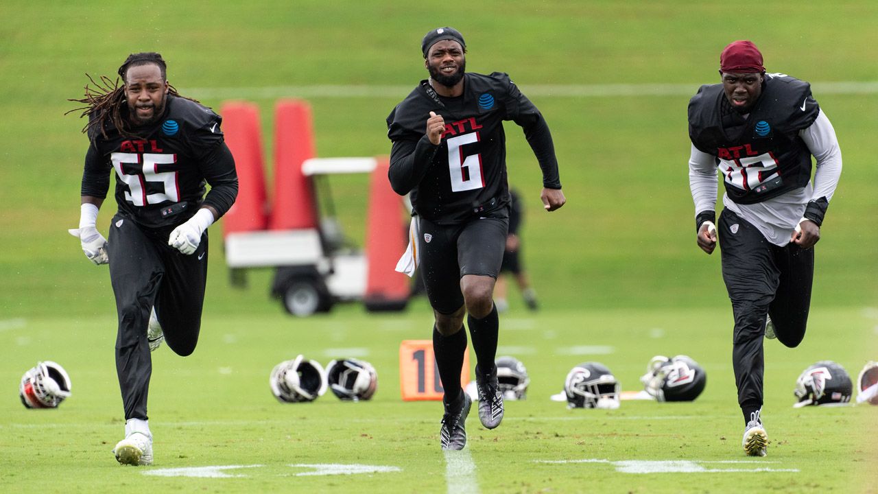 Atlanta Falcons outside linebacker Adetokunbo Ogundeji (92) works