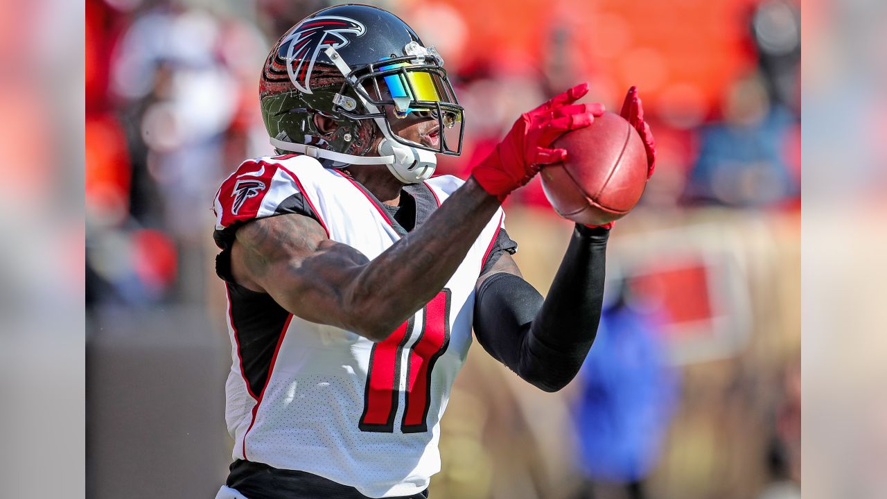 Atlanta Falcons wide receiver Justin Hardy (14) celebrates with Mohamed  Sanu (12) after his 5-yard touchdown pass over the Arizona Cardinals during  the second half of an NFL game at Mercedes-Benz Stadium