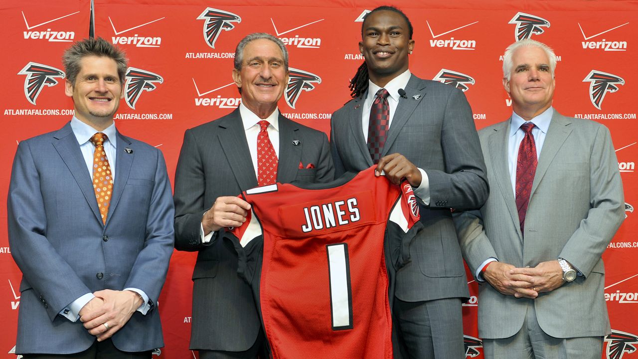 Julio Jones, wide receiver for Alabama, and number six overall pick, holds  up his new jersey after being selected by Atlanta during round one of the  2011 NFL Draft Pick at Radio