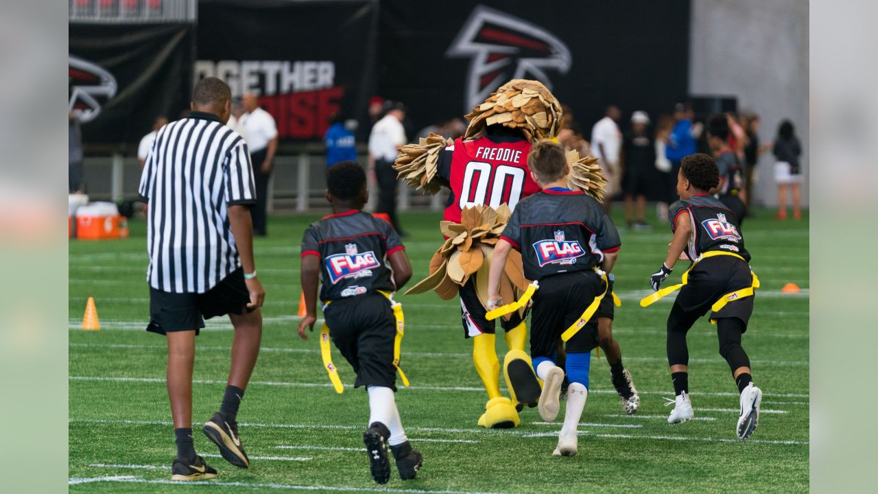 PHOTOS: NFL FLAG football teams take the field at Mercedes-Benz Stadium