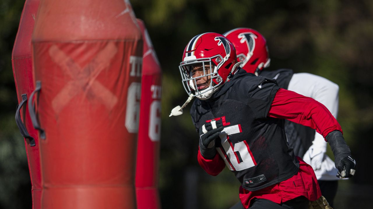 Atlanta Falcons linebacker Quinton Bell (56) works during the