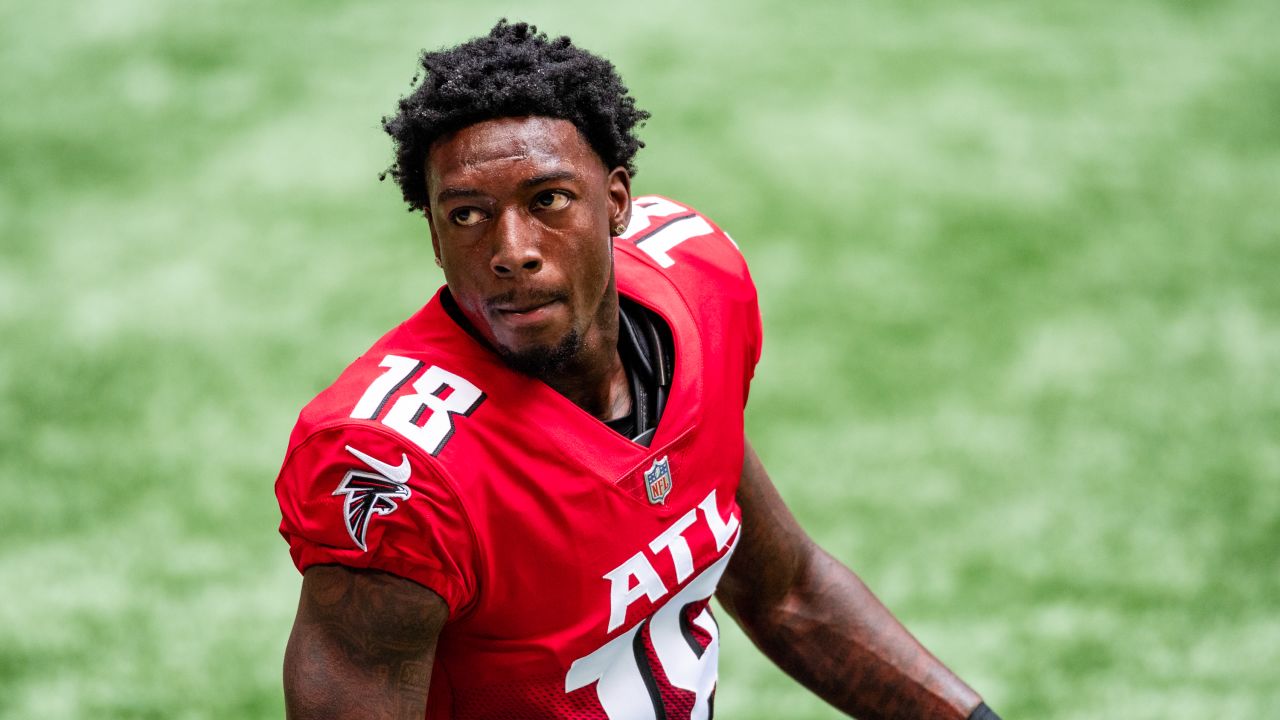 Atlanta Falcons wide receiver Christian Blake #13 runs out of the tunnel  during pregame against the …