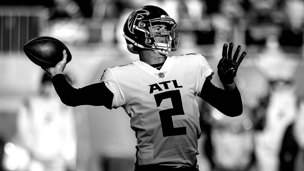 Tampa Bay Buccaneers vs. Carolina Panthers. NFL Game. American Football  League match. Silhouette of professional player celebrate touch down.  Screen in background. Stock Photo