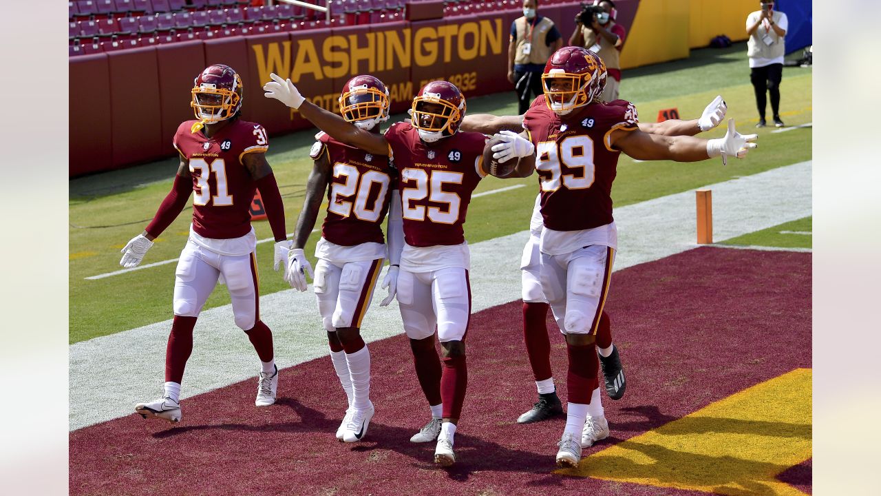 Washington Redskins free safety Montae Nicholson (left) chases New