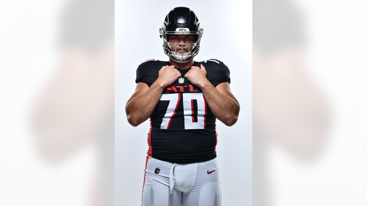 Atlanta Falcons guard Chris Lindstrom (63) on the sideline against the  Detroit Lions during an NFL football game, Friday, Aug. 12, 2022, in  Detroit. (AP Photo/Rick Osentoski Stock Photo - Alamy