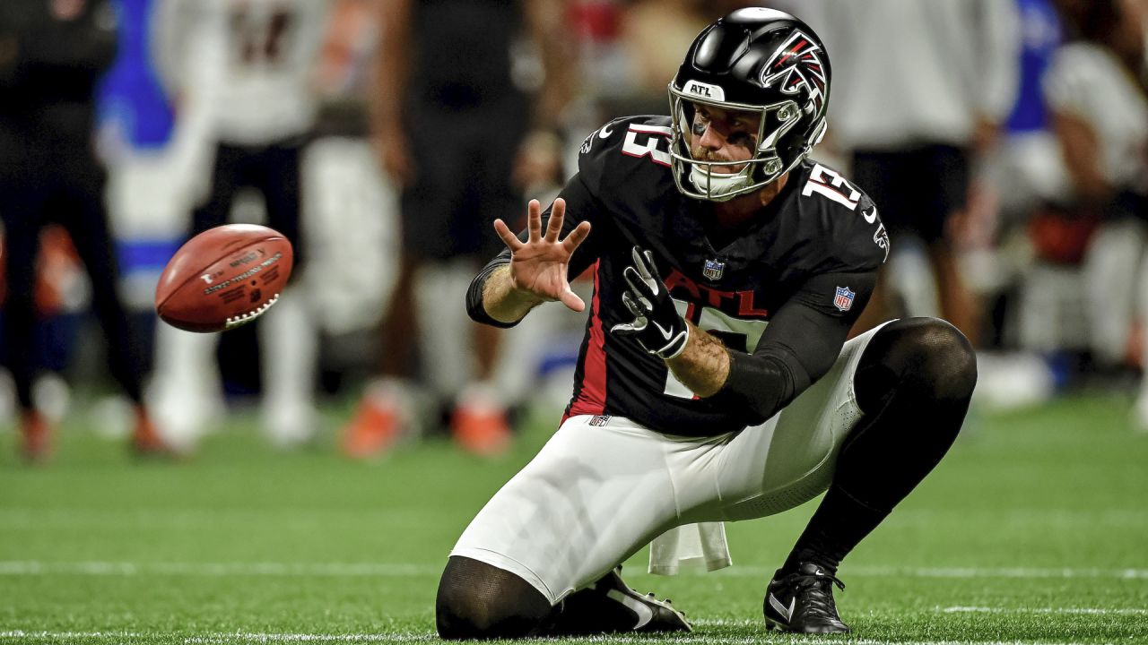 Atlanta Falcons punter Bradley Pinion (13) punts during the first